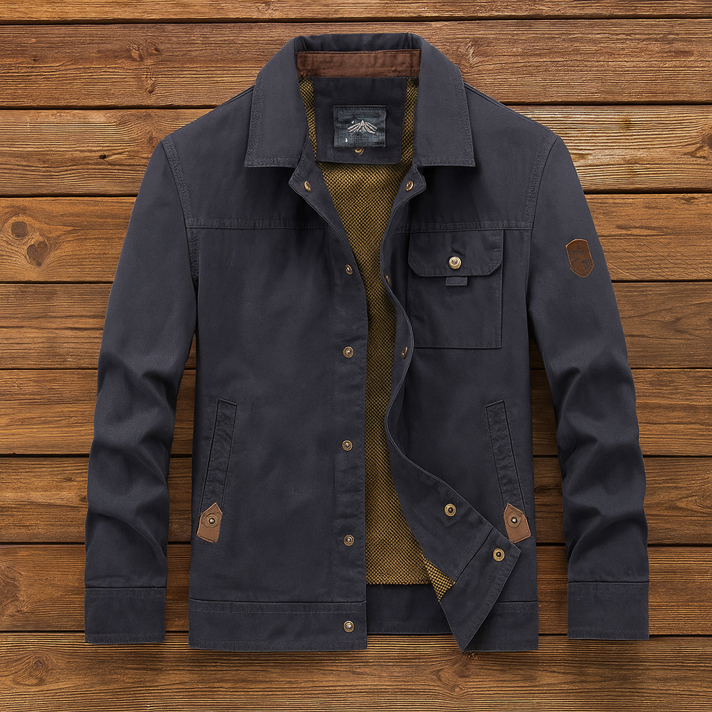 Navy utility jacket with button front, flap pockets, and diagonal inner lining detail