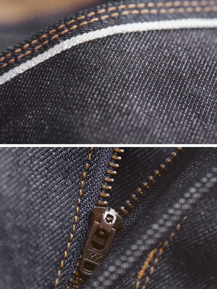 Denim jeans close-up of zipper fly with contrast tan stitching and metal pull