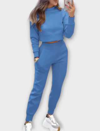 Blue casual tracksuit set with cropped sweatshirt and matching jogger pants