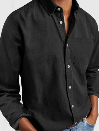 Black denim shirt with button-up front and chest pocket