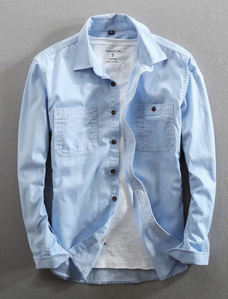 Light blue classic-fit button-front shirt with chest pockets and buttoned collar
