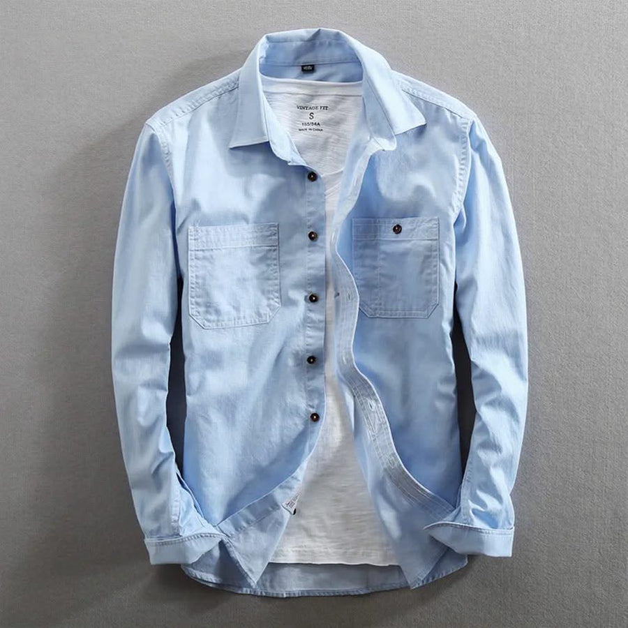 Light blue classic-fit button-front shirt with chest pockets and buttoned collar