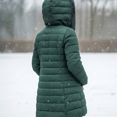 Dark green quilted hooded puffer coat back view with full hood and padded design