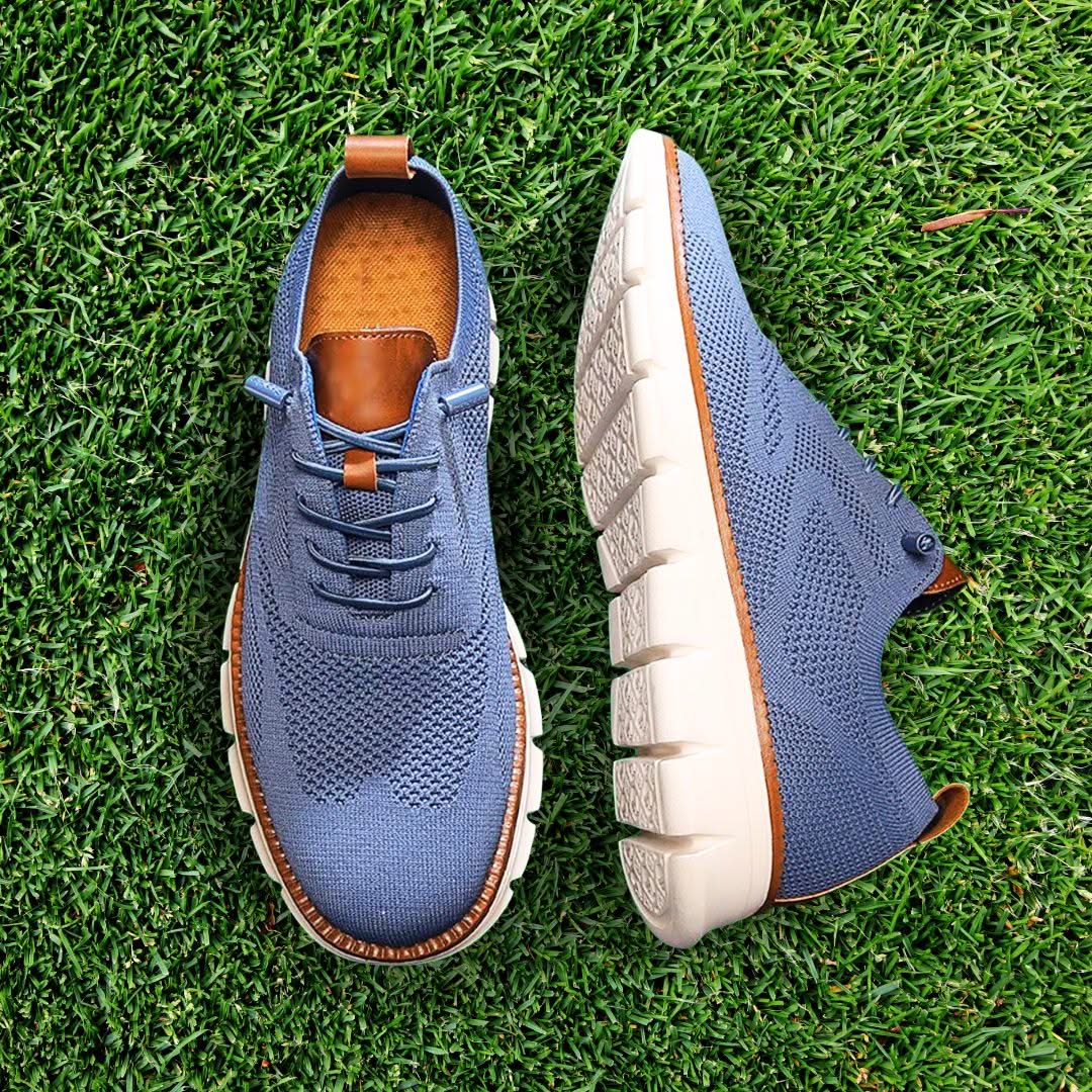 Blue knit lace-up walking shoes with brown lining accents and thick white sole