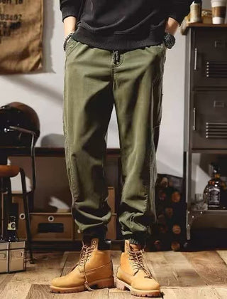 Olive green cargo pants with side cargo pocket and elastic waistband