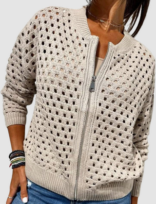 Beige openwork knitted cardigan with full front zipper and ribbed cuffs and hem