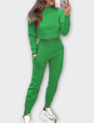 Green casual tracksuit set with cropped sweatshirt and matching jogger pants