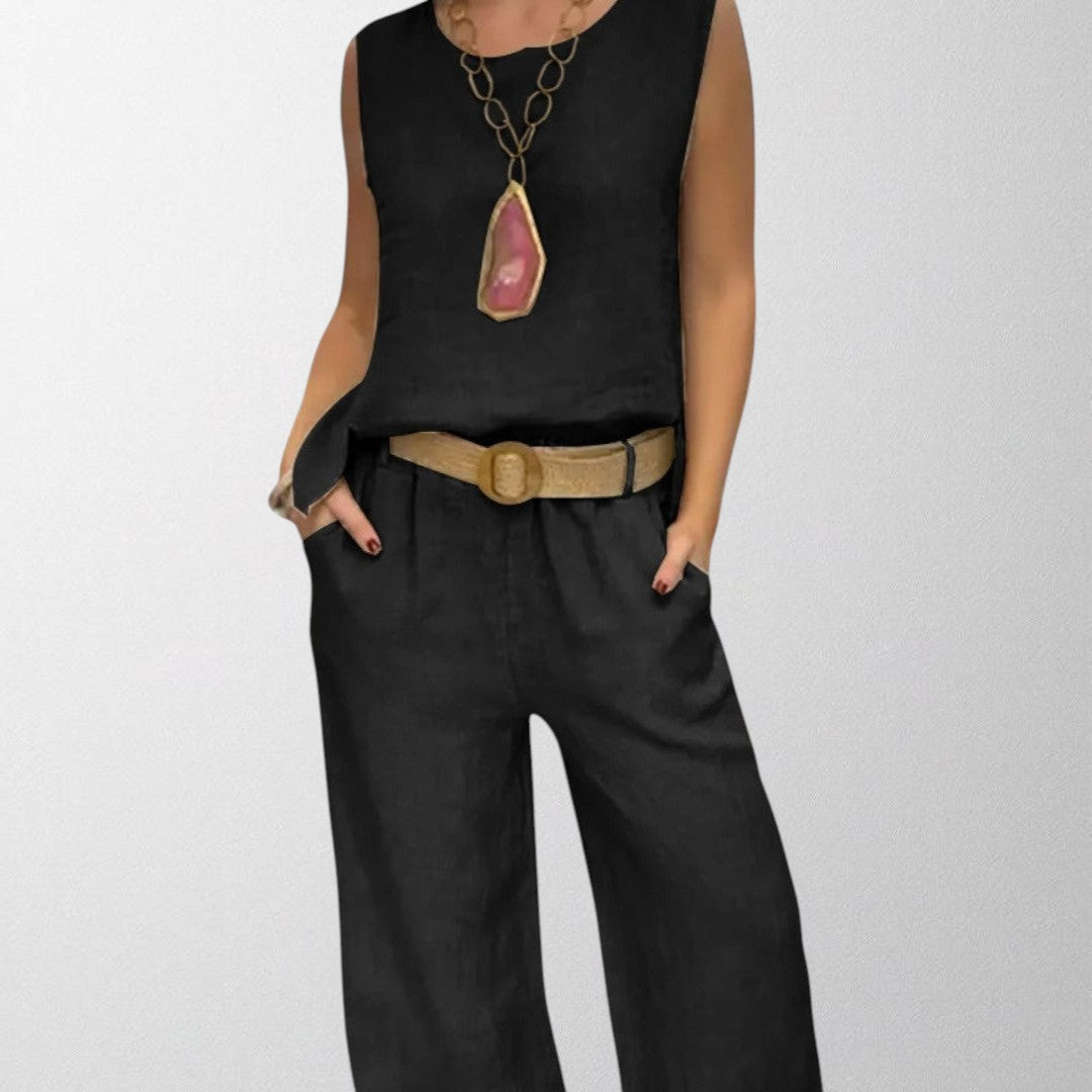 Black boho two-piece set: sleeveless top and wide-leg pants with tan belt