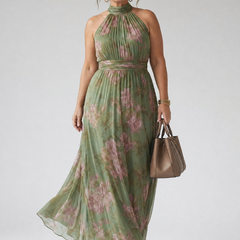 Floral gathered halter midi dress, green with pink flowers; cinched waist, flowing skirt.
