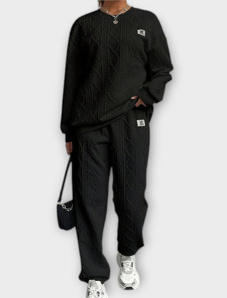 Black cable-knit casual set: round-neck long-sleeve top and matching jogger pants