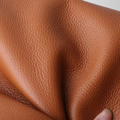 Brown vegan leather bag close-up of pebbled grain texture
