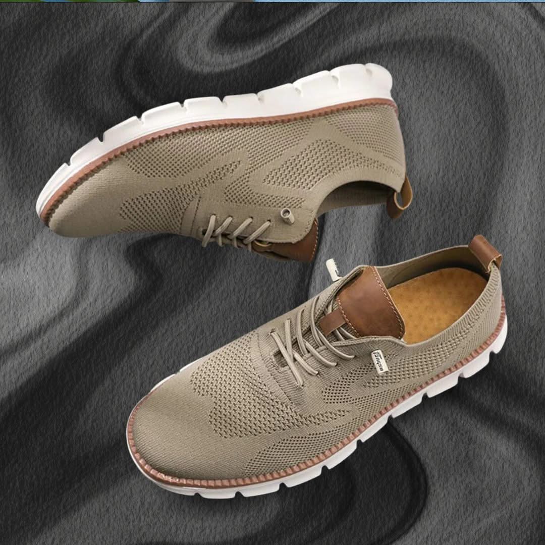 Light beige lace-up walking shoes with brown heel tab and white cushioned outsole