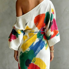 One-shoulder maxi dress back, white with multicolor abstract print and waist tie belt