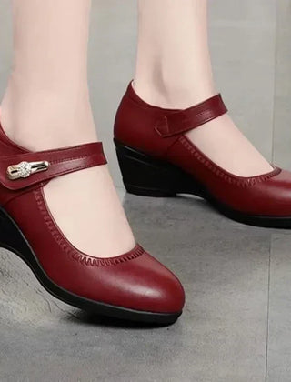 Burgundy red Mary Jane wedge heels with T-strap and decorative buckle