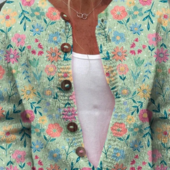 Women's vintage cardigan sweater with multicolor floral pattern, brown buttons, long sleeves