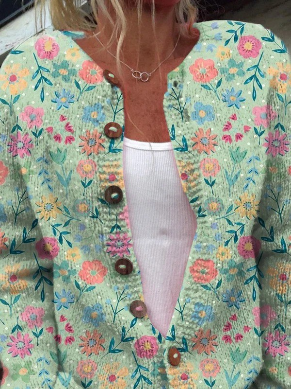 Women's vintage cardigan sweater with multicolor floral pattern, brown buttons, long sleeves