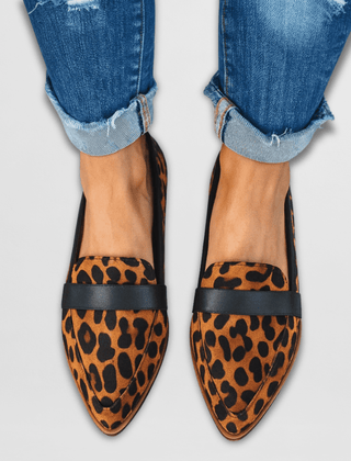 Leopard print suede loafers with black strap and pointed toe