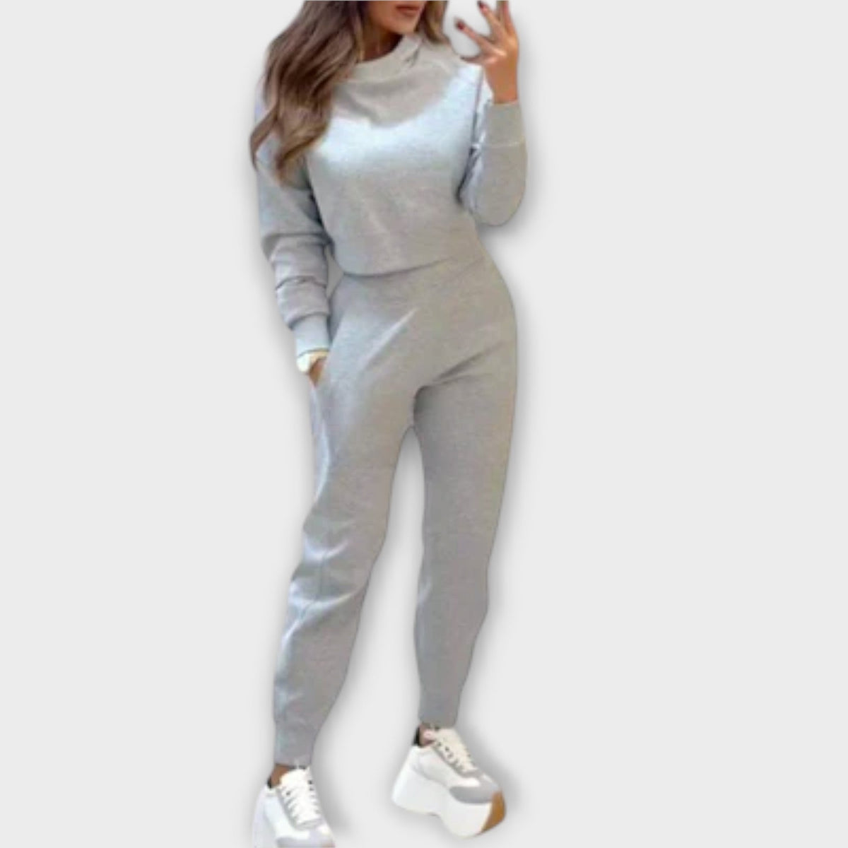 Light grey casual tracksuit set with cropped sweatshirt and matching jogger pants