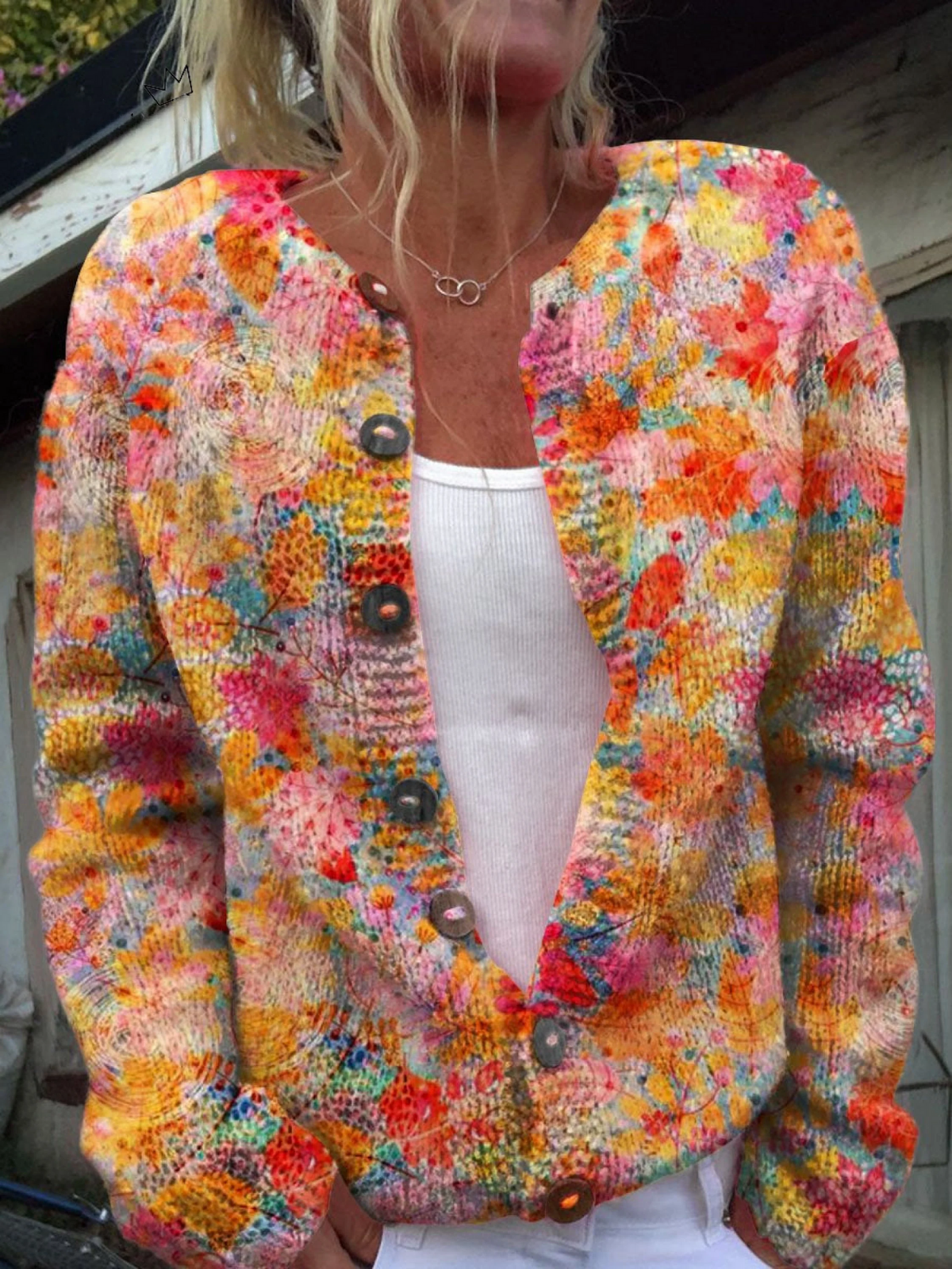 Women’s vintage knit cardigan sweater with multicolor speckled pattern and button front