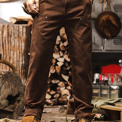 Brown straight-leg utility work pants with side pockets and belt loops