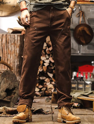 Brown straight-leg utility work pants with side pockets and belt loops