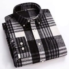 Cotton flannel plaid shirt folded view, dark gray and white checks, button front.