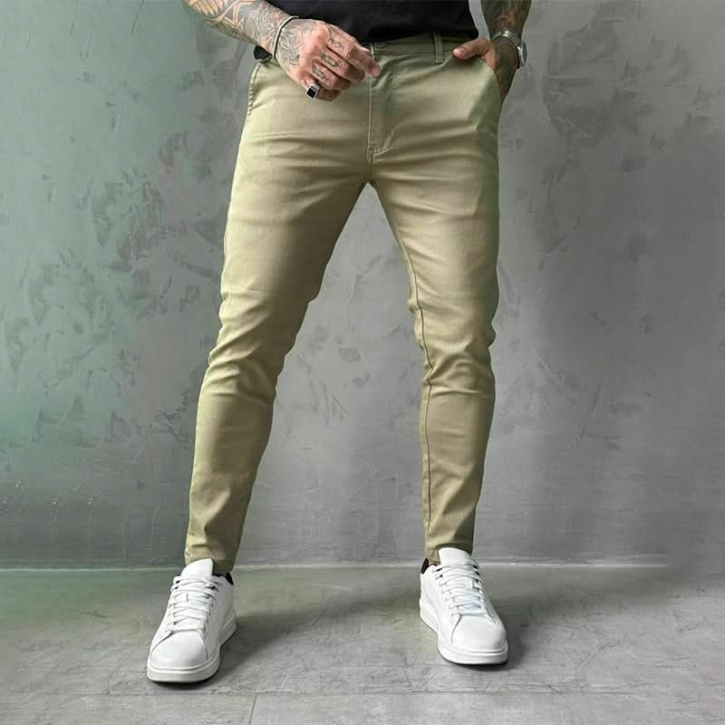 Khaki slim trousers with tapered legs, button waist, and side pockets