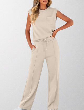 Cream sleeveless lounge co-ord set with pocket top and drawstring wide-leg pants