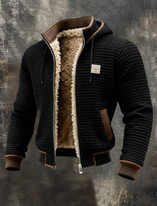 Black quilted fleece lined zip-front jacket with tan sherpa collar and brown pocket trim