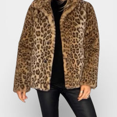 Long leopard print faux-fur coat in tan and brown with open front and standing collar