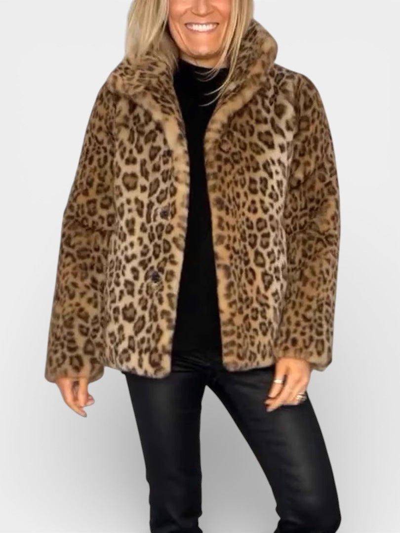 Long leopard print faux-fur coat in tan and brown with open front and standing collar
