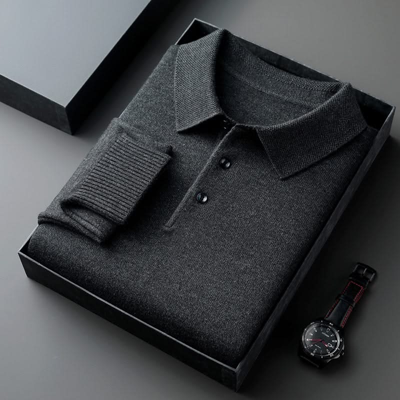 Dark grey long-sleeve knit polo shirt with button placket and fold-over collar.