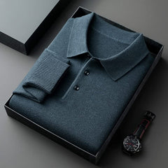 Teal long-sleeve knit polo shirt with button placket and fold-over collar.