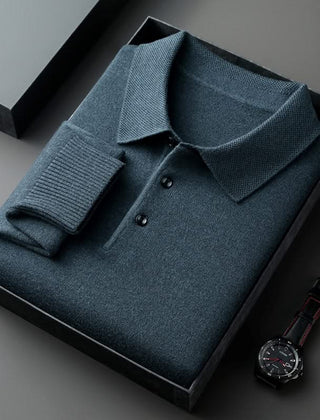 Teal long-sleeve knit polo shirt with button placket and fold-over collar.