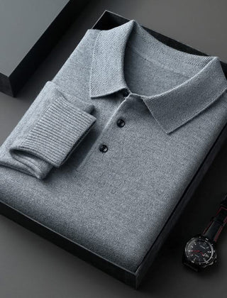 Light grey long-sleeve knit polo shirt with button placket and fold-over collar.