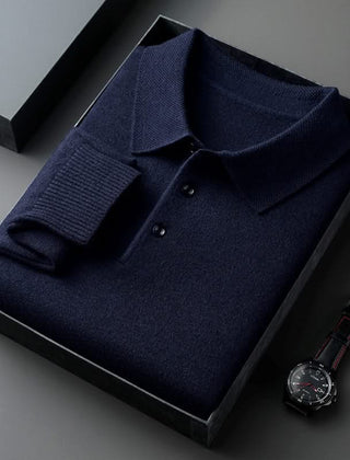 Navy long-sleeve knit polo shirt with button placket and fold-over collar.