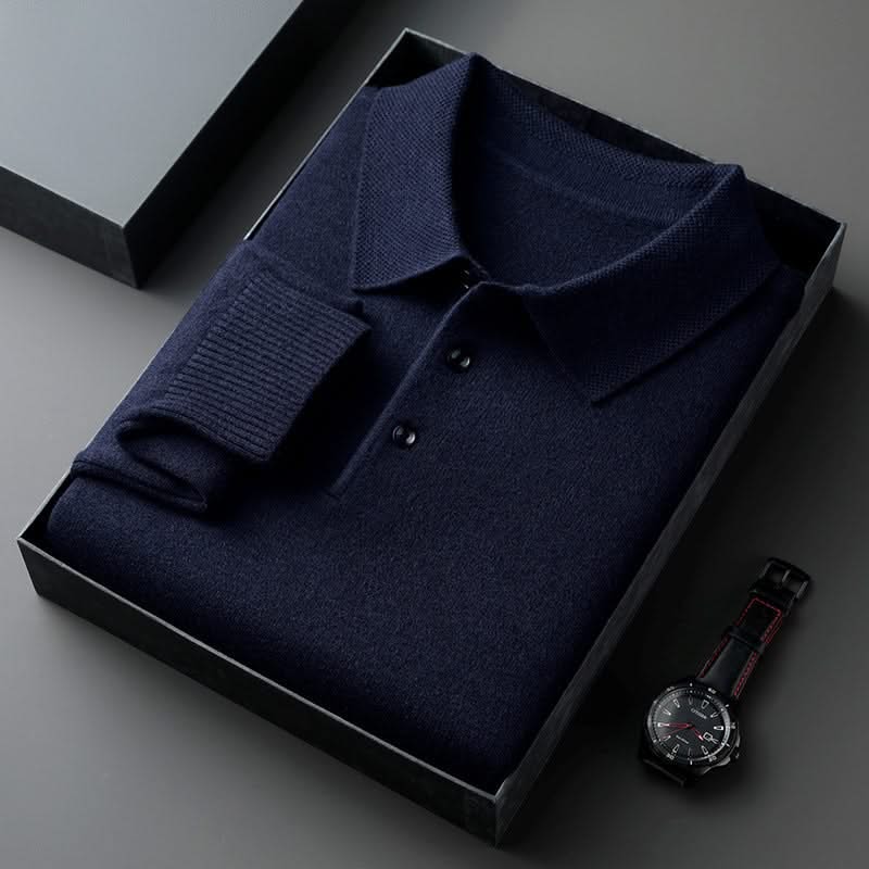 Navy long-sleeve knit polo shirt with button placket and fold-over collar.