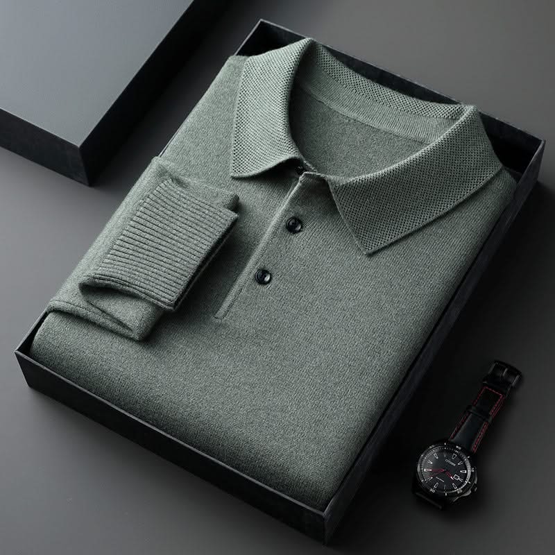 Green long-sleeve knit polo shirt with button placket and fold-over collar.