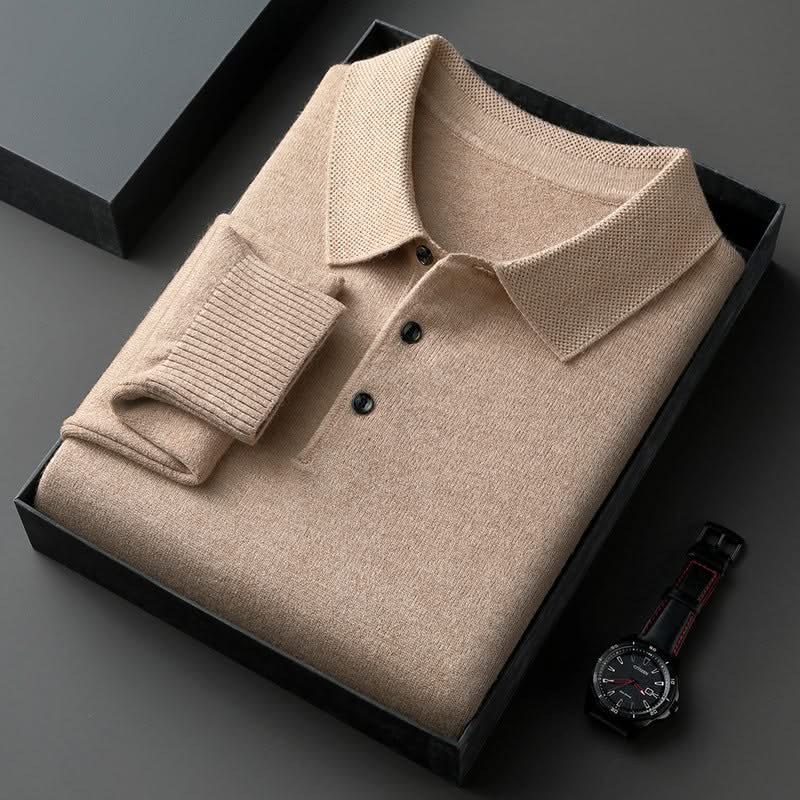 Beige long-sleeve knit polo shirt with button placket and fold-over collar.