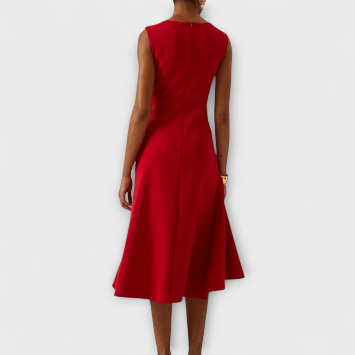 Red back view sleeveless pleated midi dress with fitted bodice and flared hem