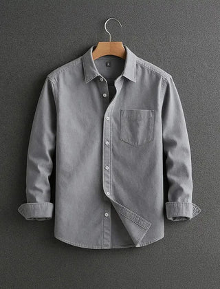 Grey long-sleeve button-up shirt with chest pocket and diagonal front panel.