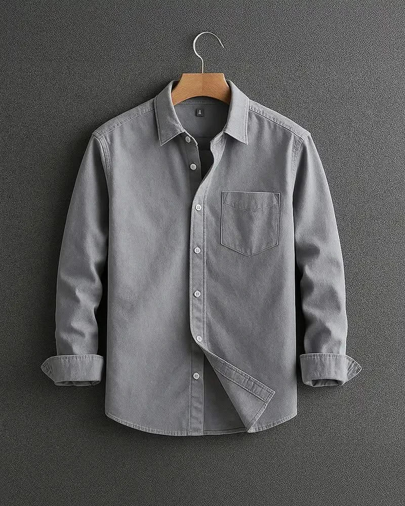 Grey long-sleeve button-up shirt with chest pocket and diagonal front panel.