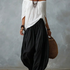 White off-shoulder top and black lantern trousers set