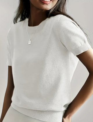 White casual crew neck short sleeve top with ribbed hem and sleeve cuffs