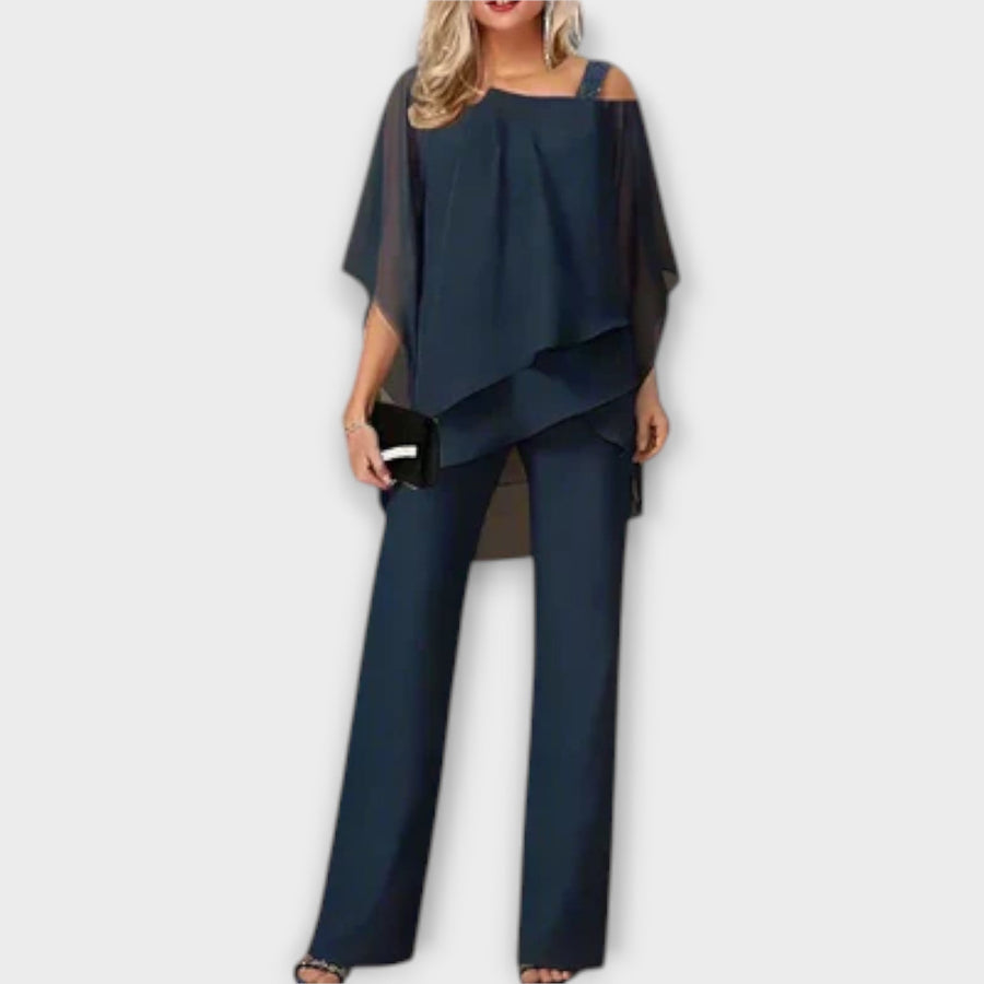 Navy chiffon cold-shoulder cape top with wide-leg trousers evening set