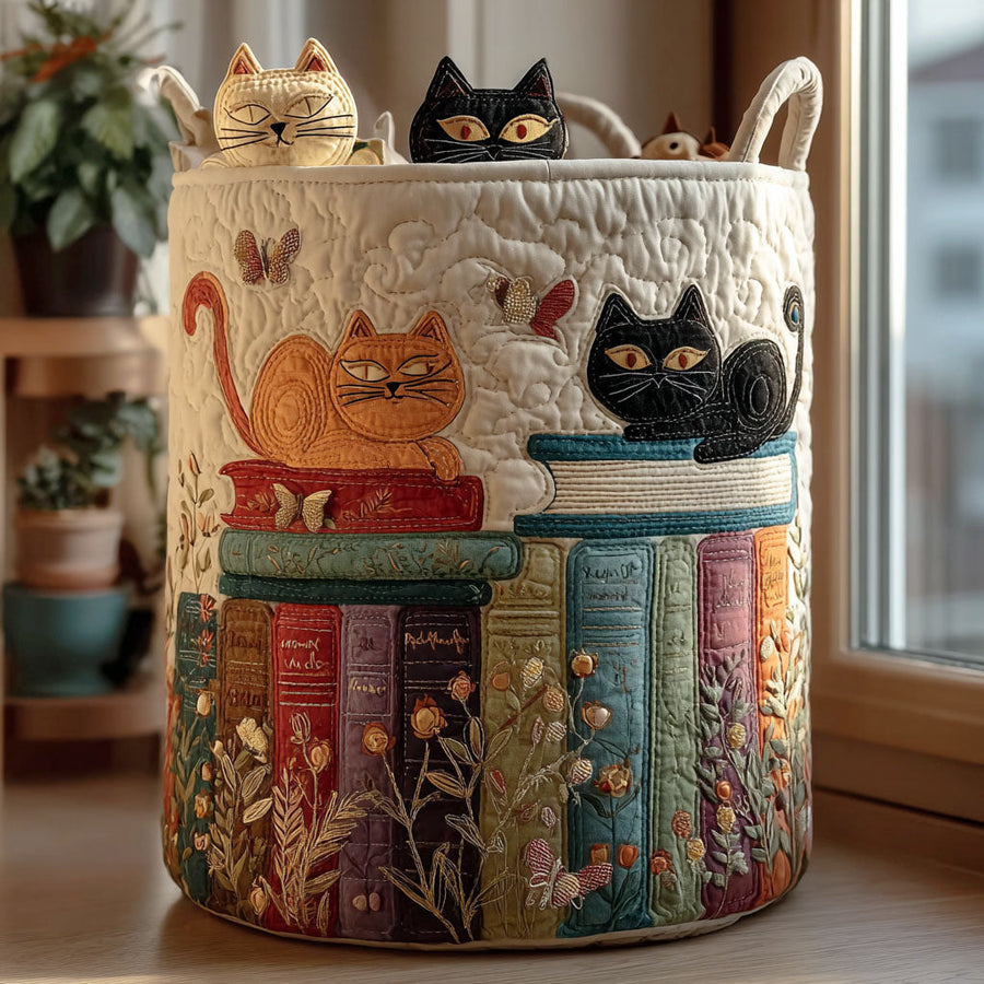 Quilted fabric laundry basket with embroidered cat parade design, round with fabric handles.