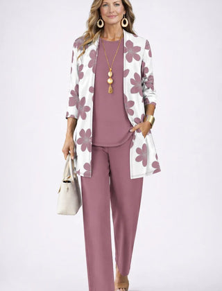 Women’s 3-piece set with mauve tunic, matching pants, and floral open-front jacket.