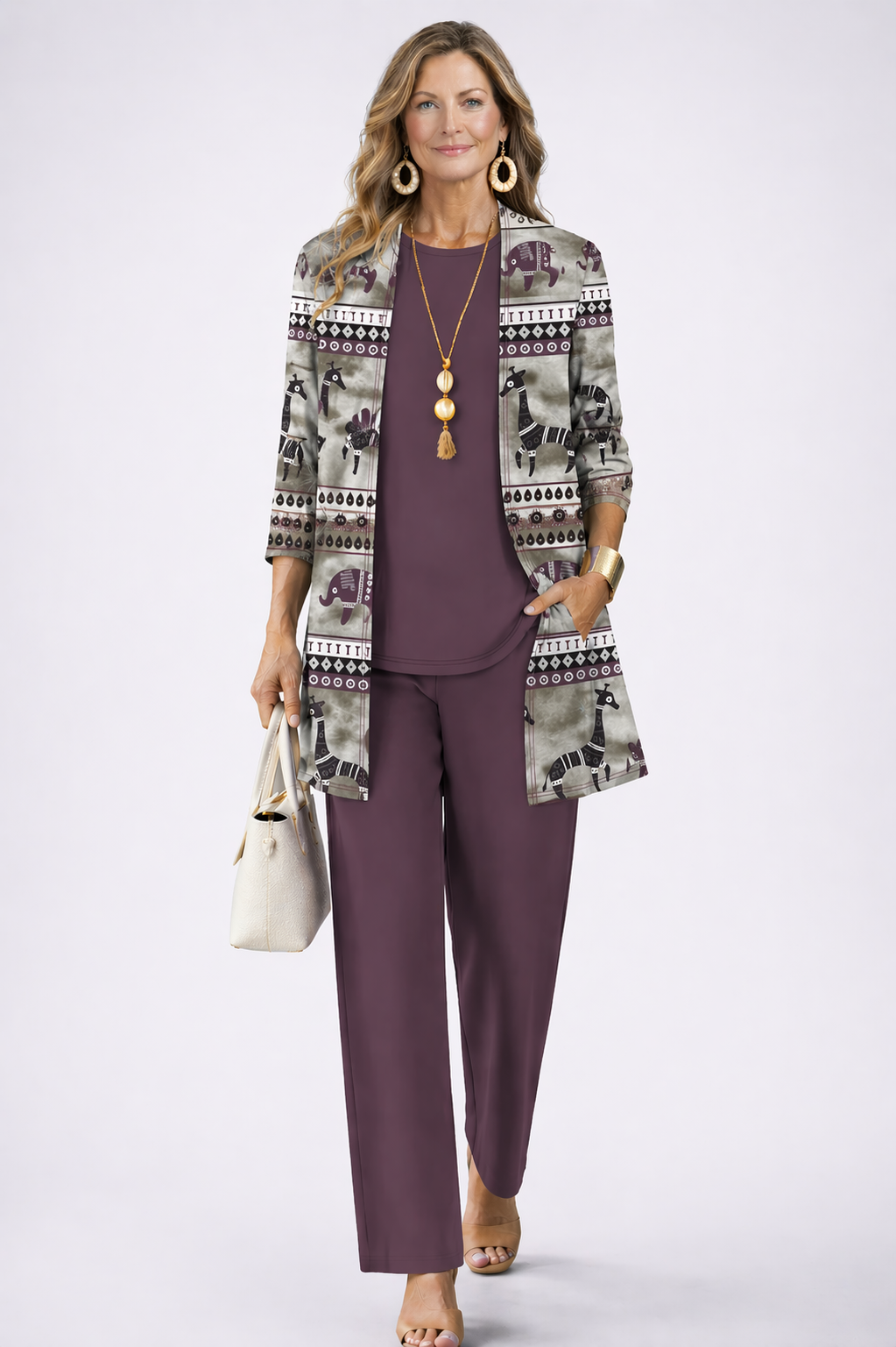 Plum purple 3-piece set with draped top, tailored pants, and patterned jacket