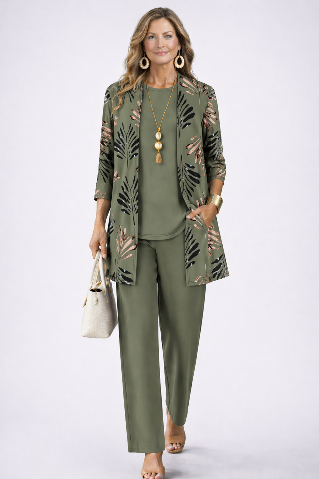Olive green 3-piece outfit with leaf-print open jacket, matching top, and straight trousers