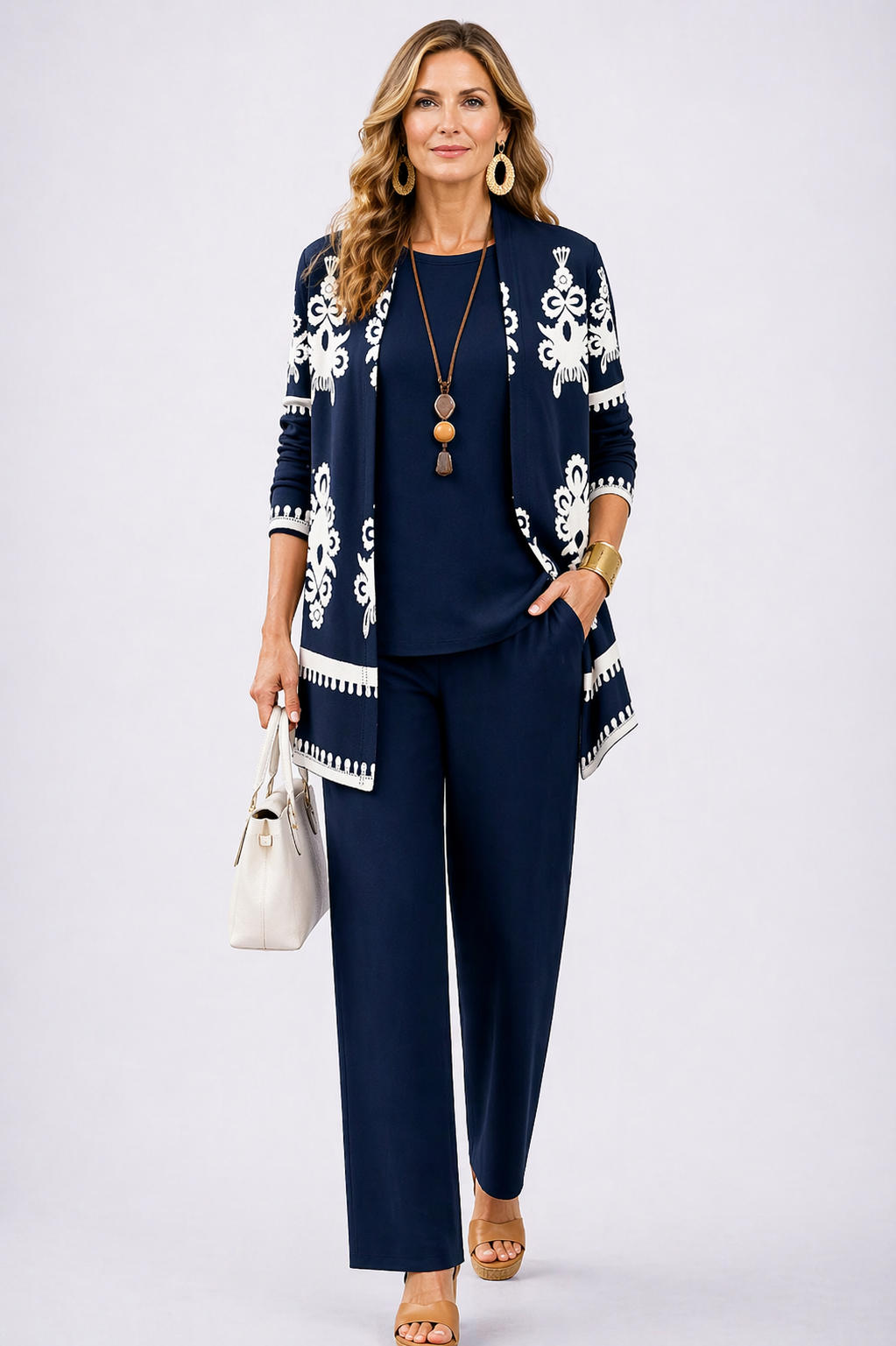 Navy blue 3-piece outfit set with patterned cardigan, top, and trousers